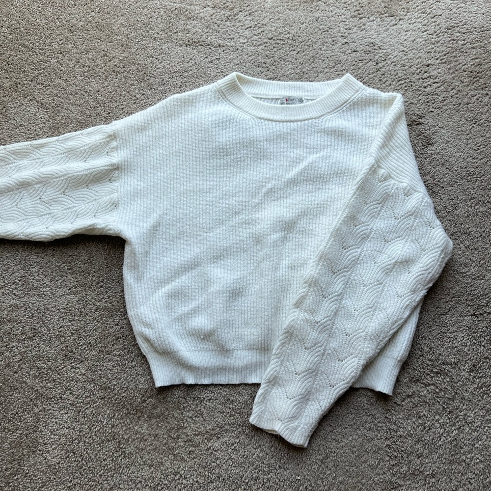 white sweater